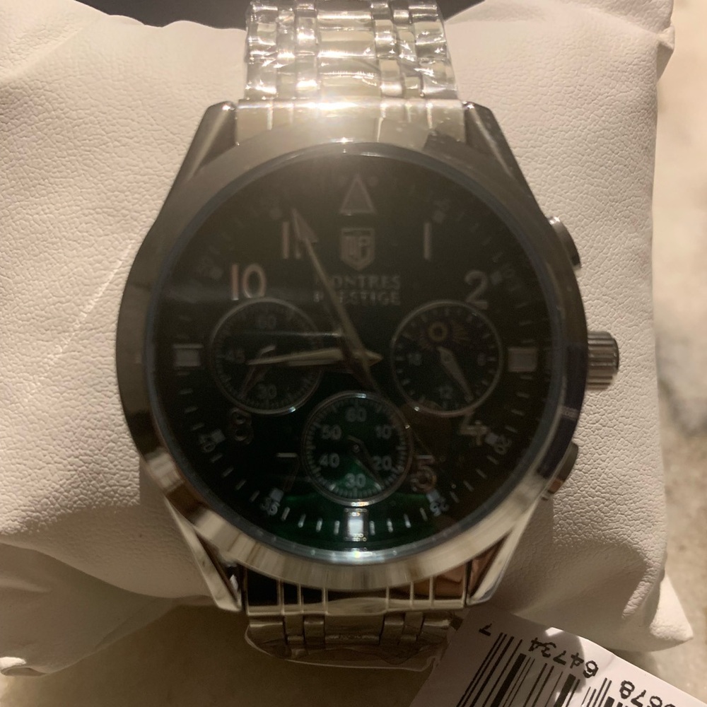 Montres De Luxe Silver and Black Watch